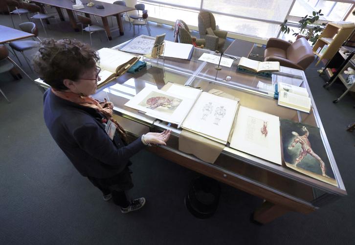 Micaela with exhibit case